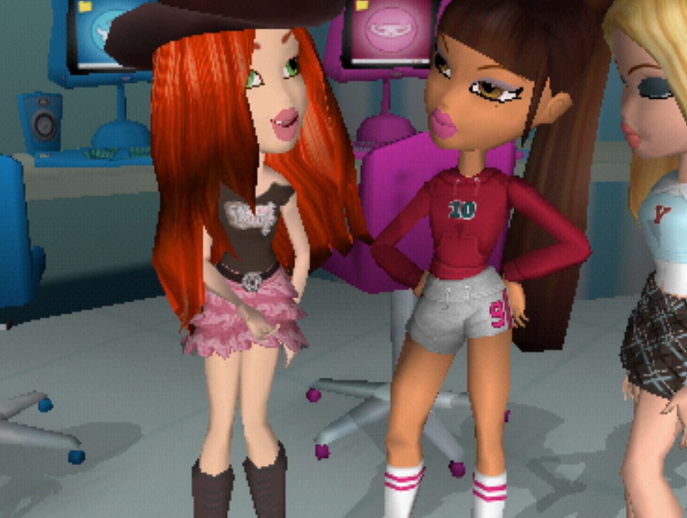 Mandy has long red hair and green eyes. She is wearing a brown off-the-shoulder top, a ruffled pink skirt, cowboy boots, and a cowboy hat. She has white skin. 